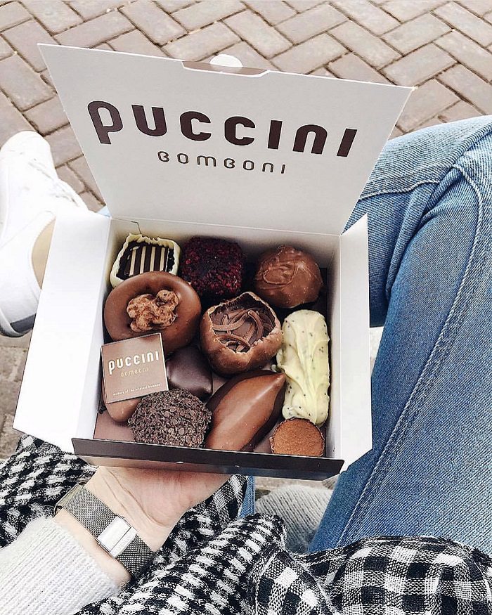 A sunny day in Amsterdam with a medium box of Puccini Bomboni